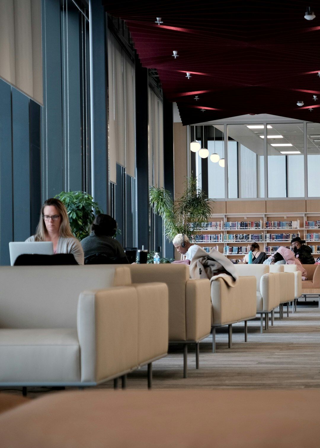 woman reading in quiet library